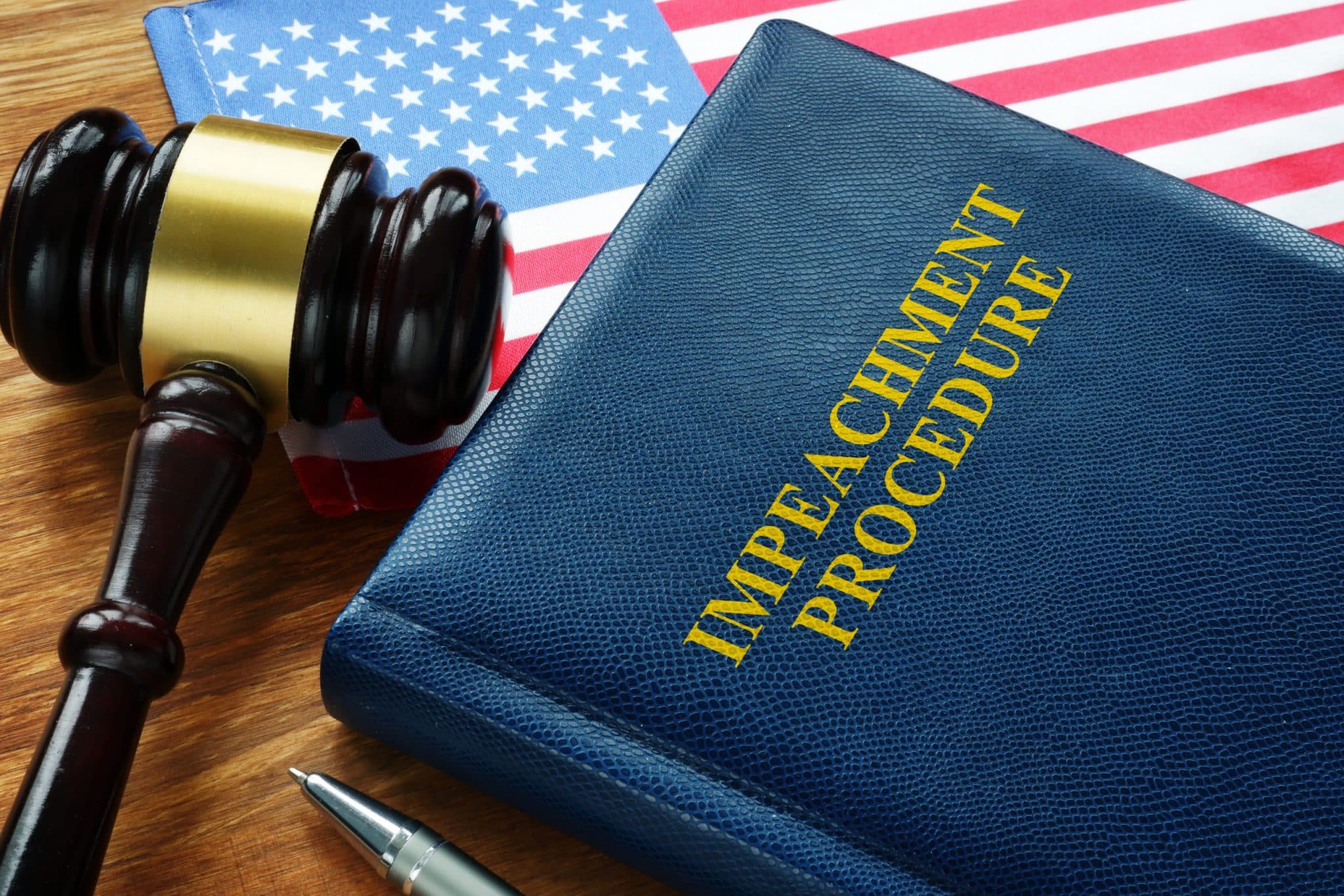 Impeachment procedure law, gavel and USA flag. us constitution and chsitianity